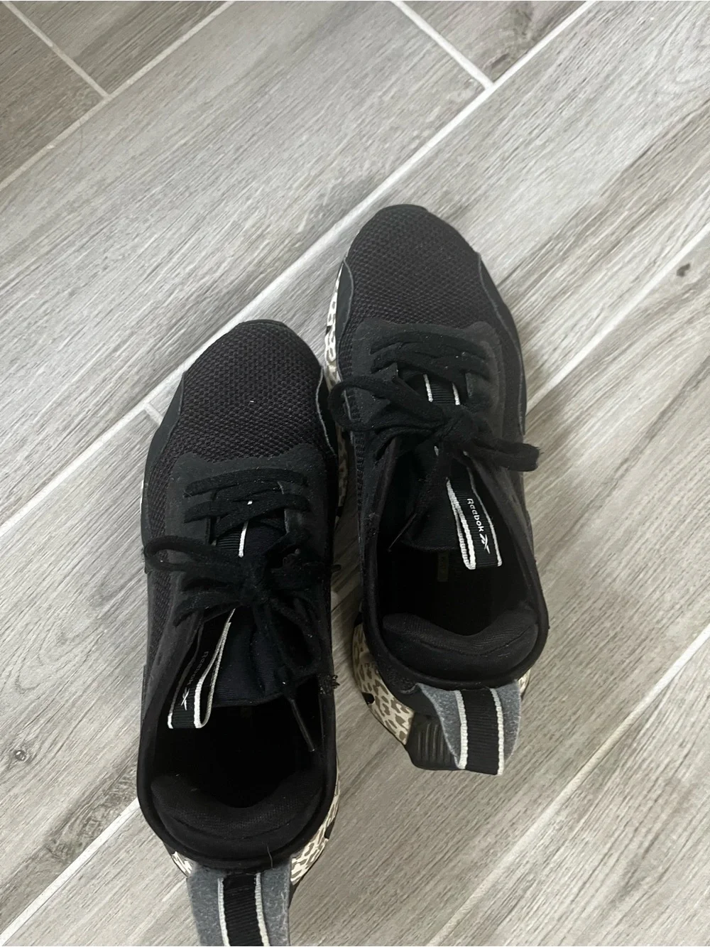 Reebok Black Athletic Sneakers with Cream Leopard-Pattern Sole